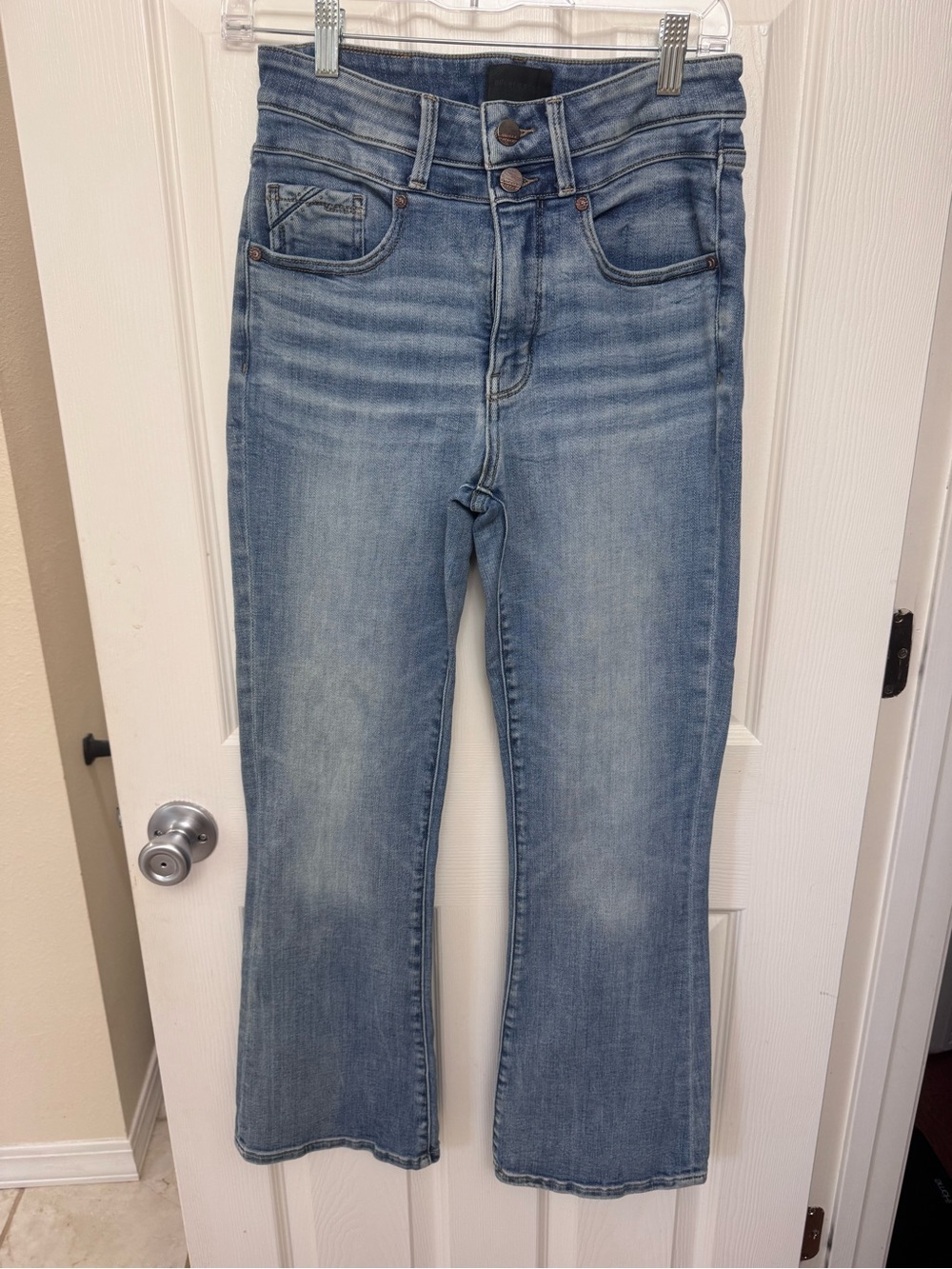 Buckle Light Blue High-Rise Boot Cut Jeans